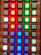 © njbfoto - A row of buttons with numbers and colors on them