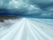 © kang - Coastal Road Under Stormy Skies: A Serene Beachscape