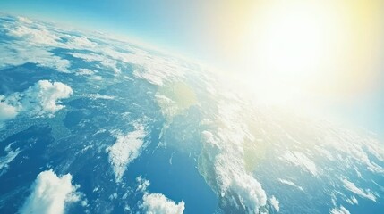 Wall Mural - sunlit earth viewed from space, showing clouds, land, and ocean.