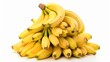 © Somsom - A luscious arrangement of freshly harvested ripe bananas clustered together on a crisp white background showcasing the natural beauty and vibrant color of this tropical fruit