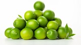 Neatly stacked pile of vibrant green limes arranged on a clean white surface  This simple yet striking image captures the natural freshness and juicy texture of these citrus fruits