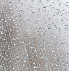 Wall Mural - A window with raindrops on it