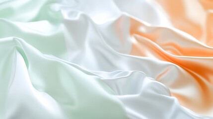Poster - A close-up of flowing fabric in green, white, and orange hues.