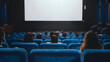 © Badisaba - A movie theater showcases a large screen with people