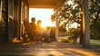 © Soklin - A family sitting on their porch, enjoying a quiet moment together as they watch the sunset.