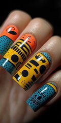 Wall Mural - Close-up of female hand with colorful, geometric nail art.