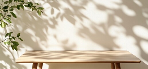 Poster - A minimalist wooden table with soft shadows from nearby foliage.