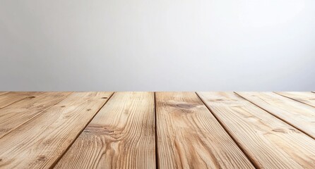 Poster - A wooden tabletop with a smooth, light-colored surface and a plain backdrop.