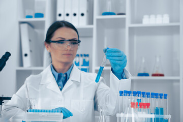 Aufkleber - A scientist is analyzing samples in a laboratory, focusing on their biochemical properties and exploring innovative solutions in healthcare and biomedical research to advance science and medicine
