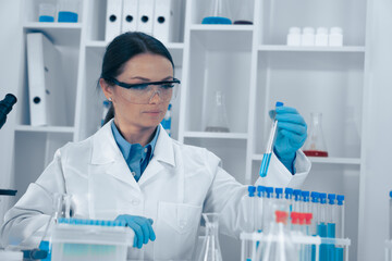 Aufkleber - A skilled female scientist is conducting a crucial lab experiment, showcasing her expertise in biology and chemistry essential for her important research in the scientific community