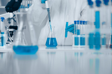 Aufkleber - A dedicated scientist conducts detailed liquid measurements in a controlled environment, using precise instruments and quality glassware to ensure accurate results that advance research and knowledge