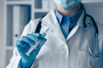 Poster - A healthcare professional diligently preparing a vaccine for administration in a clinic setting, showcasing the importance of careful procedures and adhering to safety protocols ahead of treatment