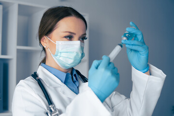 Aufkleber - A dedicated healthcare professional is focused on preparing a vaccine injection with precise care and attention to detail in a clinical setting to ensure safety and effectiveness of the procedure