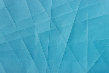 abstract light blue crumpled paper texture background