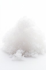 Poster - A pile of fresh snow sits on top of a snowy ground, perfect for winter scenes or festive decorations