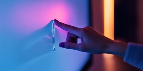 Poster - A hand gently touches a brightly lit, modern surface, creating a subtle interaction with vibrant colors in a futuristic environment.