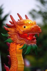 Poster - A close-up view of a dragon's head on top of a pole, great for fantasy or mythological themed designs