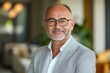 © dgpatel - mature 50 year old confident professional manager, confident businessman investor looking at camera, smiling mid aged older business man executive standing in office, Generative AI