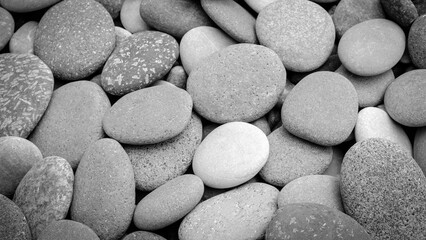 Poster - abstract black and white background with round pebble stones
