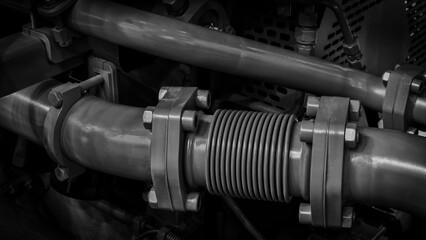 Aufkleber - black engine with a white part. The engine is a large piece of machinery