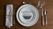 © Loki Studio - Elegant dinner table setting for fasting representation with decorative plate and utensil, fasting text, napkin, and cutlery on wooden surface