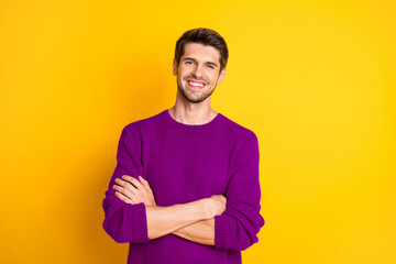 Poster - Portrait of charming man with his hands crossed wear red jumper isolated over yellow background