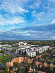 Wall Mural - Aerial View of Buildings at Greater Manchester Central City, Northwest of England, United Kingdom. Aerial View Footage Was Captured with Drone's Camera on May 4th, 2024 During Sunset Time.