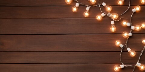 Poster - Cozy Festive Ambiance Glowing Light Bulbs on Rustic Wooden Background