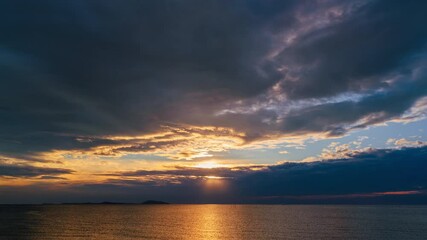 Wall Mural - 4K clouds and sunlight natural landscape at sunset.Colorful sky cloud natural background.4K Time lapse.