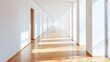 © Saripudin - Sunlit hallway with hardwood floor and white walls.