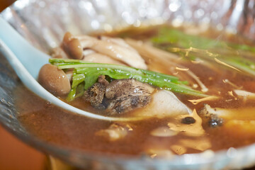 Wall Mural - Abalone vegetable soup in a bowl