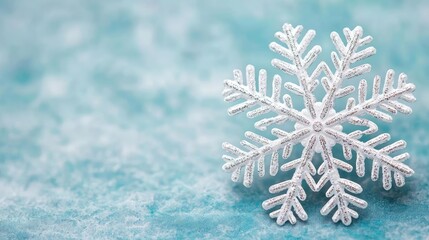 Aufkleber - Snowflake abstract background idea. A delicate snowflake resting on a soft blue background, embodying winter's beauty.