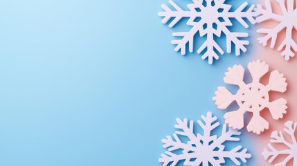Poster - Snowflake abstract background idea. Delicate paper snowflakes on a soft blue background, perfect for winter decoration themes.