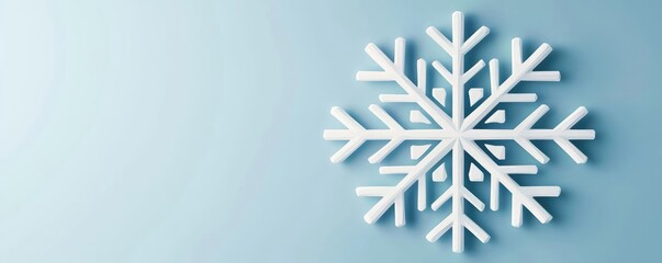 Poster - Snowflake abstract background idea. A beautiful snowflake design on a soft blue background, symbolizing winter's beauty.