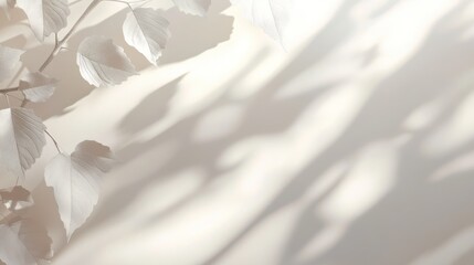 Poster - Soft light casts shadows of pale leaves on a beige background.