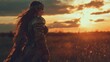 © musa - Female warrior in armor at sunset, overlooking field.