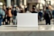 © Roman - Blank card stands prominently against blurred crowd, inviting cr