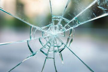 A shattered glass surface with sharp fragments