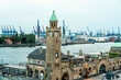 © Westend61 - Hamburg Landungsbruecke with the Elbe and the harbor in the background at sunset in Hamburg, Germany