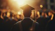 © El - Rear view of Graduates attending a graduation ceremony at a university. Cinematic shot. with a little sunlight, blurred background. Closeup.