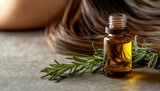 Beside her are oil bottles, hair and leaves.