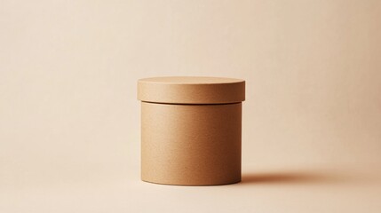 Poster - round kraft paper box on simple beige background with soft shadows