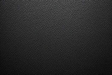 Poster - Textured black background with embossed circular patterns.