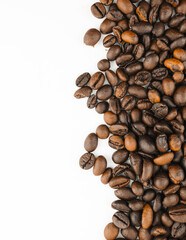 Roasted coffee beans on white background. A perfect image for coffee shops, cafes, and beverage brands. Use this image to promote your coffee products.