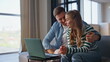 © stockbusters - Romantic pair talking online meeting by laptop at home closeup. Couple calling