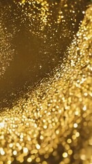 Wall Mural - Golden glitter particles shimmering dynamically against a black background, evoking luxury and elegance. Perfect for festive or celebratory themes with copy space.