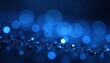 © photohappy - Abstract blue glowing particles, bokeh effect , backdrop, dark