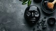 © elena - Preparing cosmetic black mask on gray background