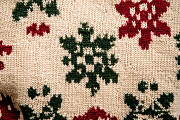 Sticker - A red, green, and white Christmas sweater pattern background, designed for holiday cards, posters, or banners.