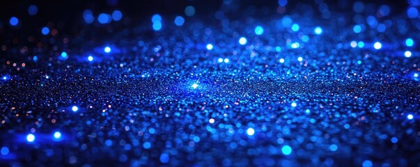 Poster - Sparkle abstract background concept. A mesmerizing display of shimmering blue particles creating an enchanting atmosphere.